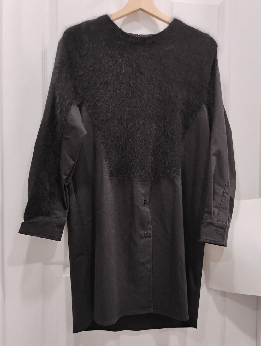 Relaxed fit Shirt/Dress with faux fur detail.